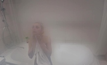 Teen In The Bathtub Relishing A Long Steam Shower